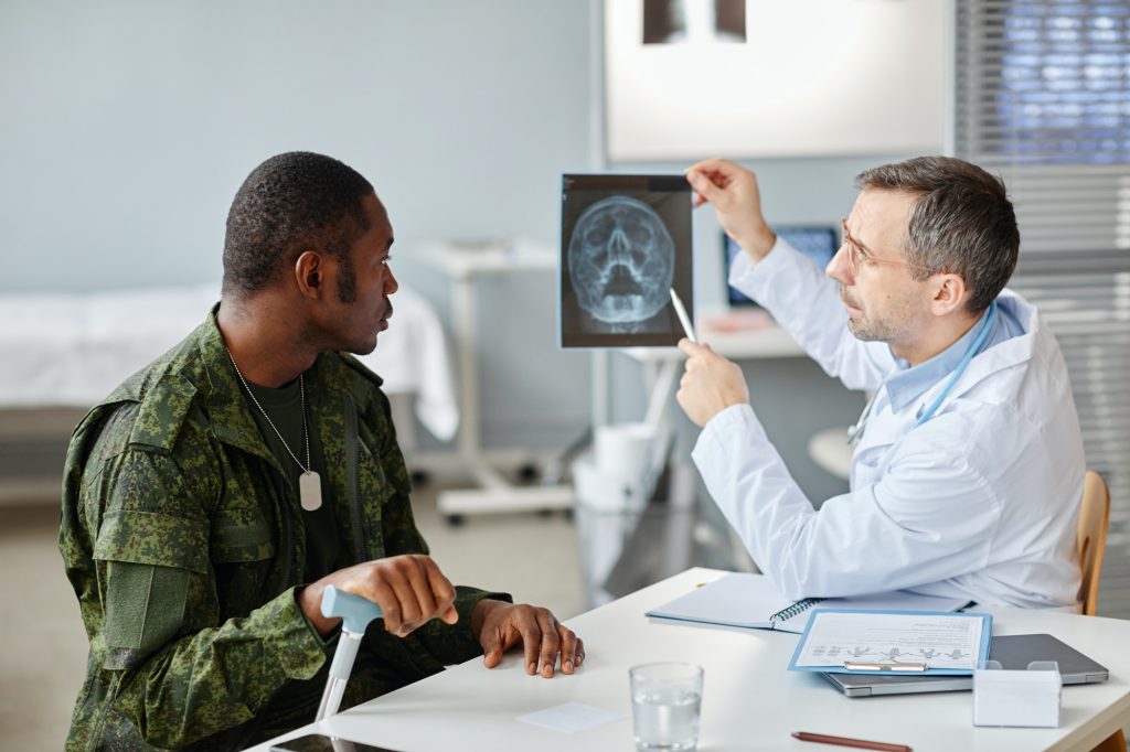 Showing Skull X-ray To Patient